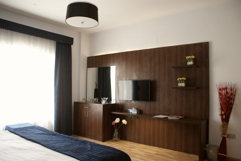 Weekend Hotel & Apartments Maszkat Szoba fotó